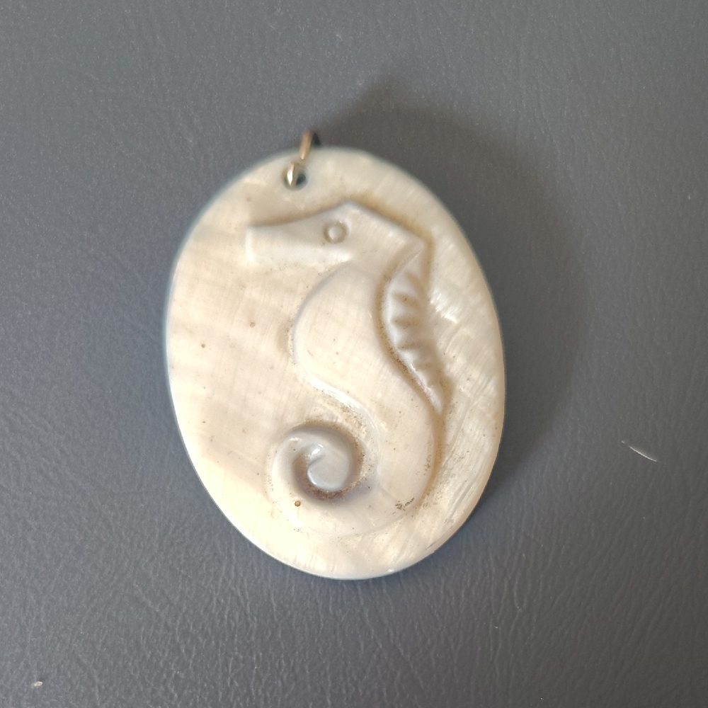 Vintage Carved Seahorse Pendant White With Blue Hues on Front Blue Back